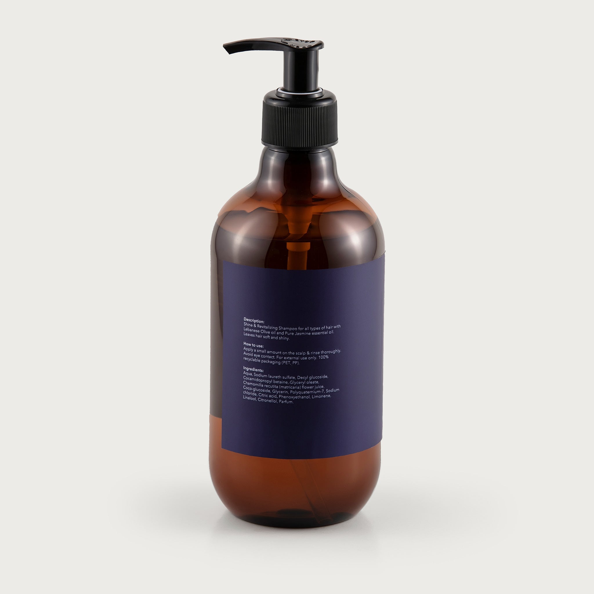 This pump top bottle is amber in color so you can see the clear shampoo inside. The label is deep purple and features the Salma logo and the Pure Jasmine scent notated.