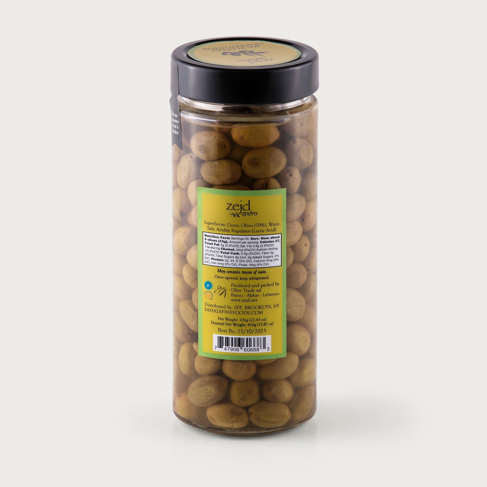 This tall jar of olives is clear in color and you can see the souri green olives and their brine. The lid is black, the label is yellow with a green border. The Zejd logo is present, alongside an illustration of olives and the product name Souri Green Cracked Olives.